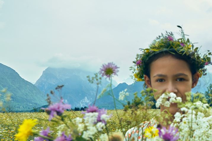 child with flower